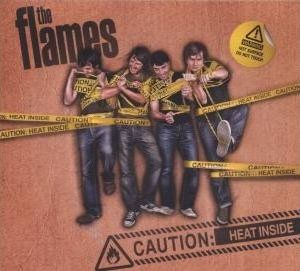 Read more about the article THE FLAMES – Caution: heat inside